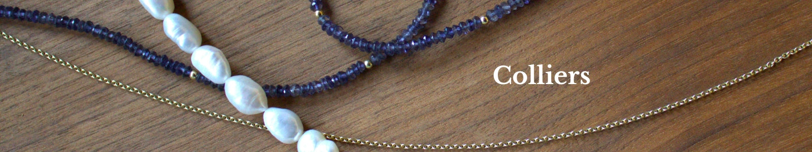 Handgemaakte colliers met hoogkwalitatieve edelmetalen, edelstenen en parels met een natuurlijke twist. 